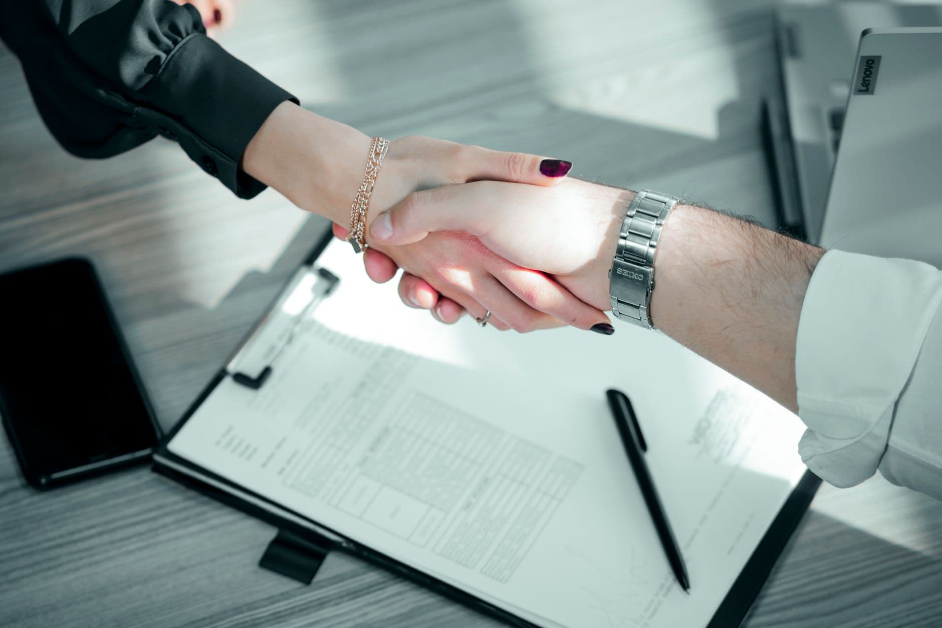 Business partners shaking hands during a meeting