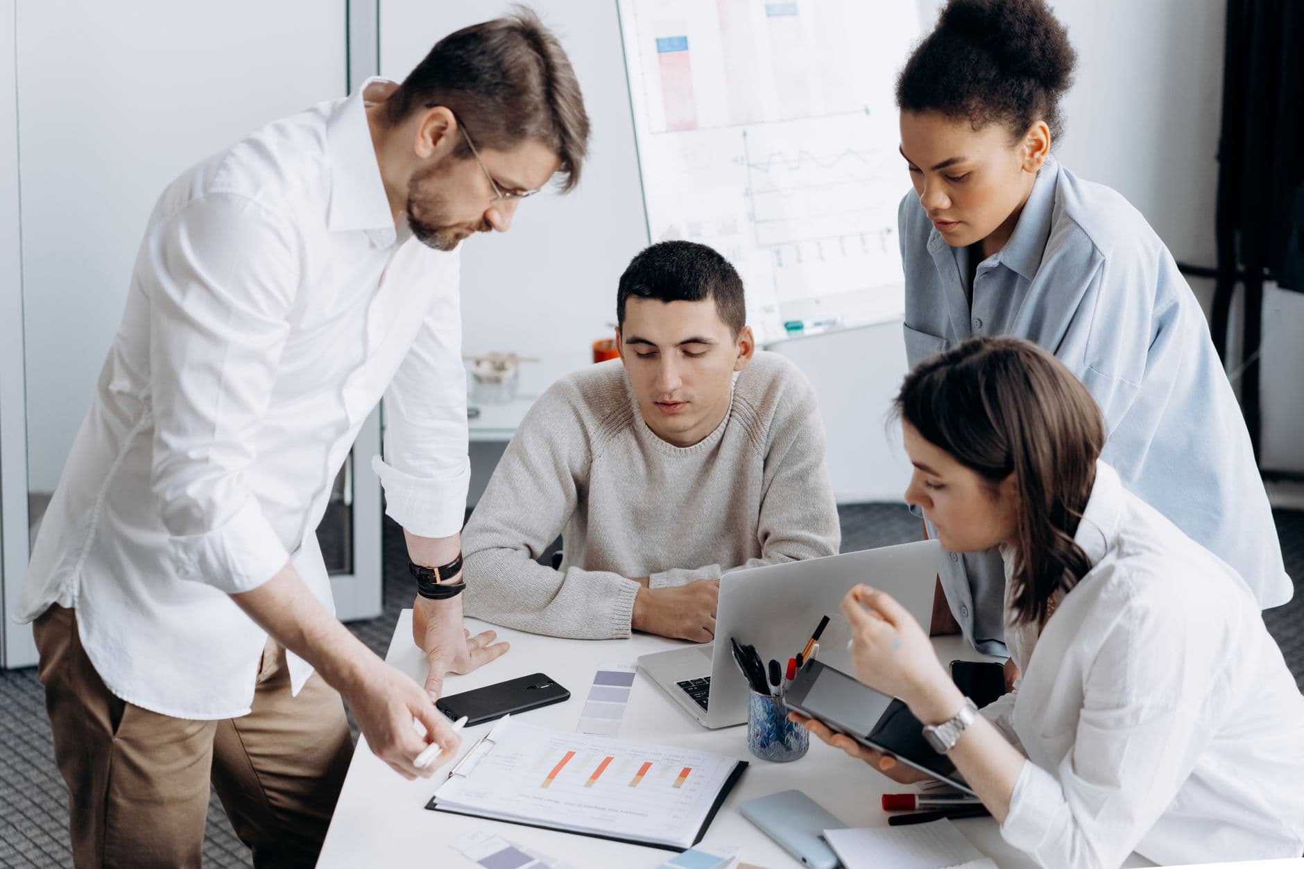 IT team planning cloud strategy in a meeting room