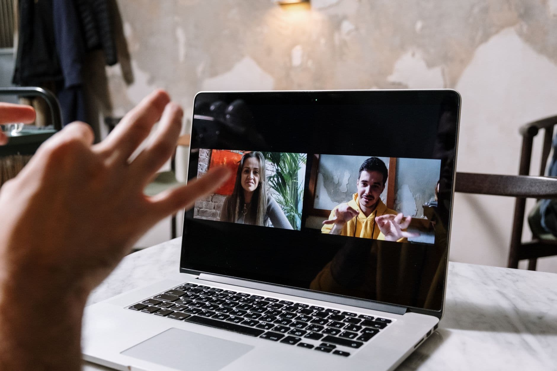 Office team on a collaborative video call through a laptop